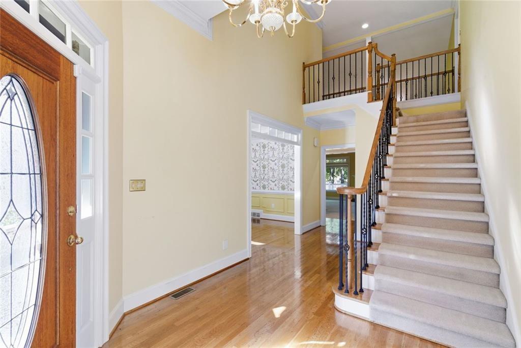 1401 Downington View Acworth, GA 30101 - Photo 6 of 57 a view of entryway and hall with wooden floor