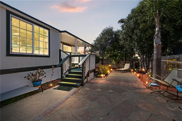 a view of outdoor space with seating and trees
