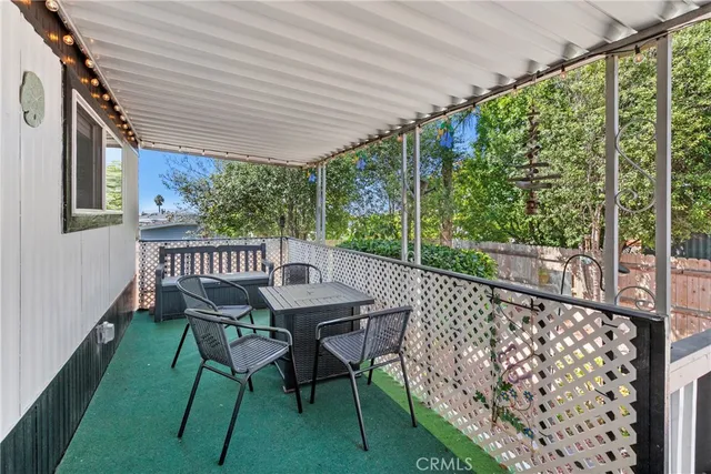 a view of a two chair in the balcony