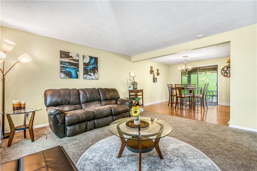 190 McChain Road Finleyville, PA 15332 - Photo 6 of 25 The living room opens up to the updated dining room.