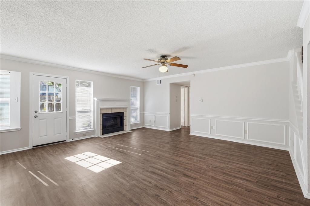 318 Lodge Road Coppell, TX 75019 - Photo 13 of 35 Spacious and inviting, the family room combines classic trim detail, rich flooring and an easy connection to the rest of the home.