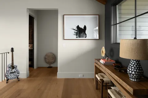 a view of room with window and wooden floor