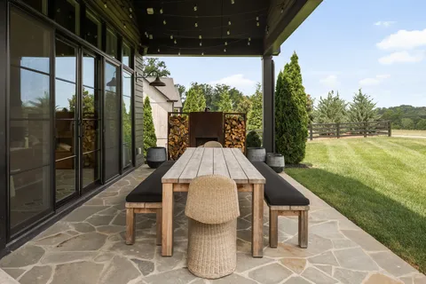 a view of a porch and garden
