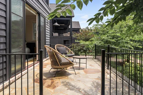 a view of a porch with a tree