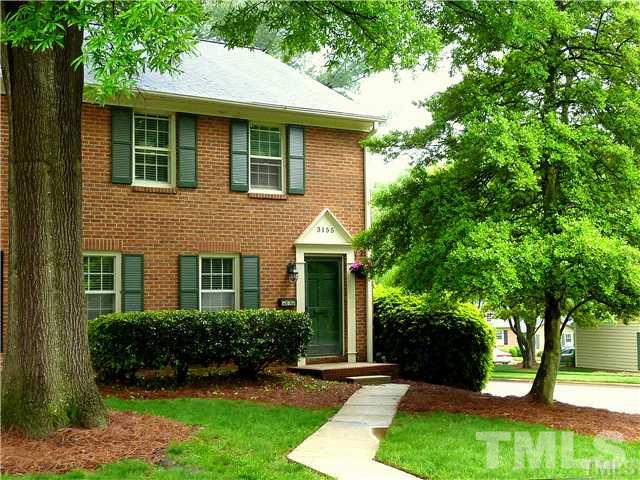 3155 Morningside Drive Raleigh, NC 27607 - Photo 1 of 9 a front view of a house with a yard