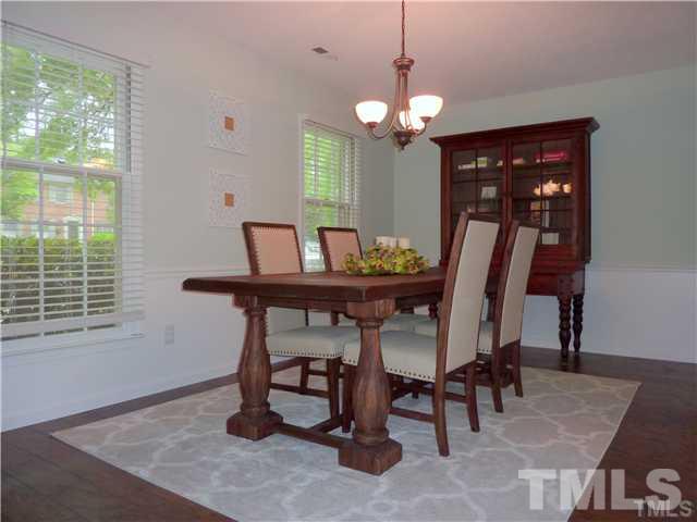 3155 Morningside Drive Raleigh, NC 27607 - Photo 3 of 9 a view of a dining room with furniture and window