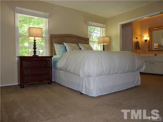 3155 Morningside Drive Raleigh, NC 27607 - Photo 4 of 9 a bedroom with a bed and window