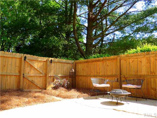3155 Morningside Drive Raleigh, NC 27607 - Photo 5 of 9 a backyard of a house with sitting area