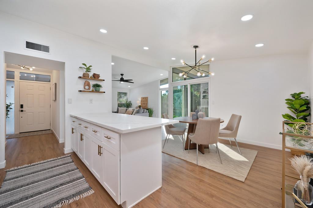 4812 Packard Court Carmichael, CA 95608 - Photo 12 of 39 a living room with furniture and a chandelier