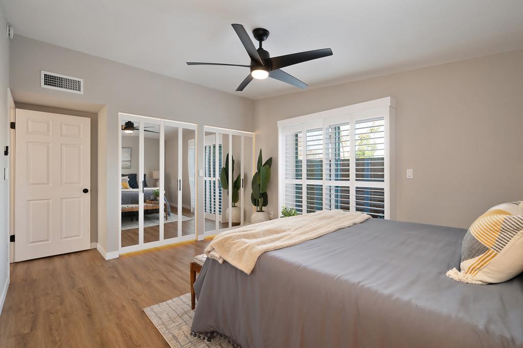 4812 Packard Court Carmichael, CA 95608 - Photo 16 of 39 a bedroom with a bed and a large window