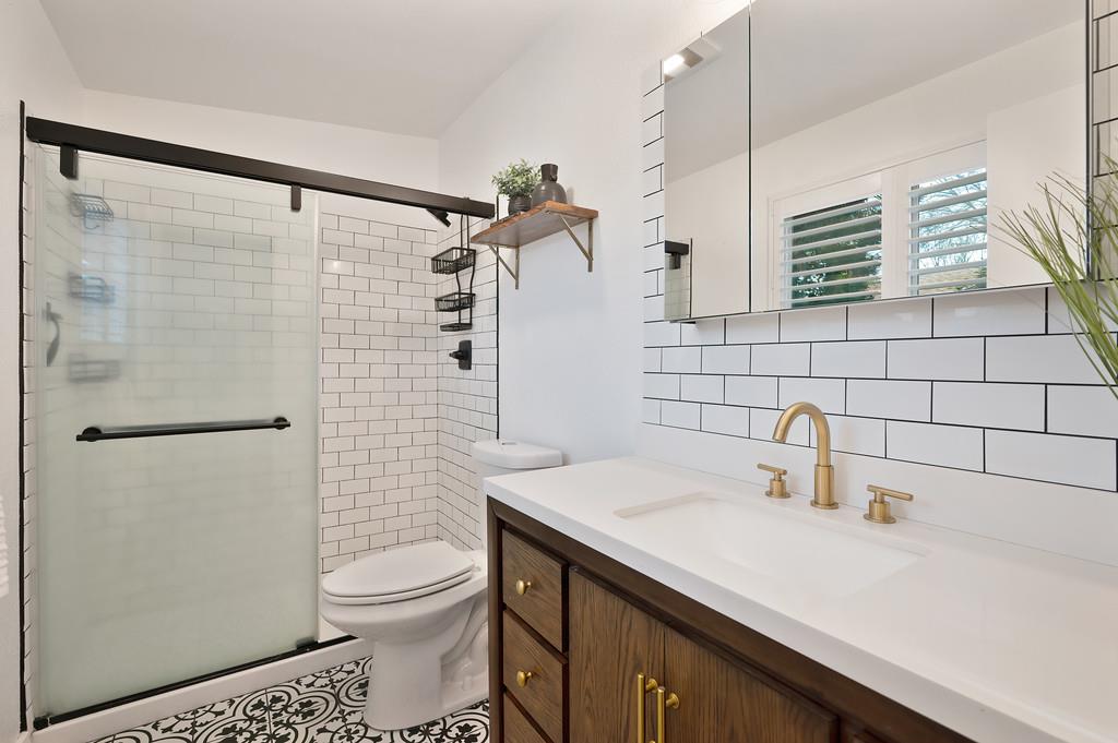 4812 Packard Court Carmichael, CA 95608 - Photo 17 of 39 a bathroom with a sink toilet and shower