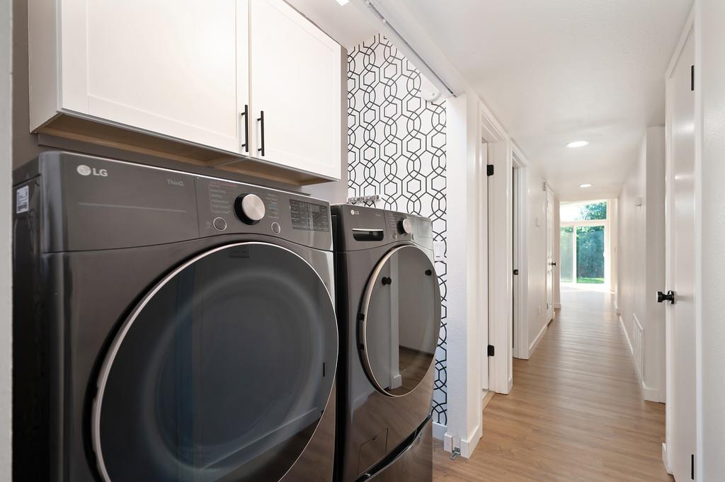 4812 Packard Court Carmichael, CA 95608 - Photo 25 of 39 a view of a hallway with washer and dryer