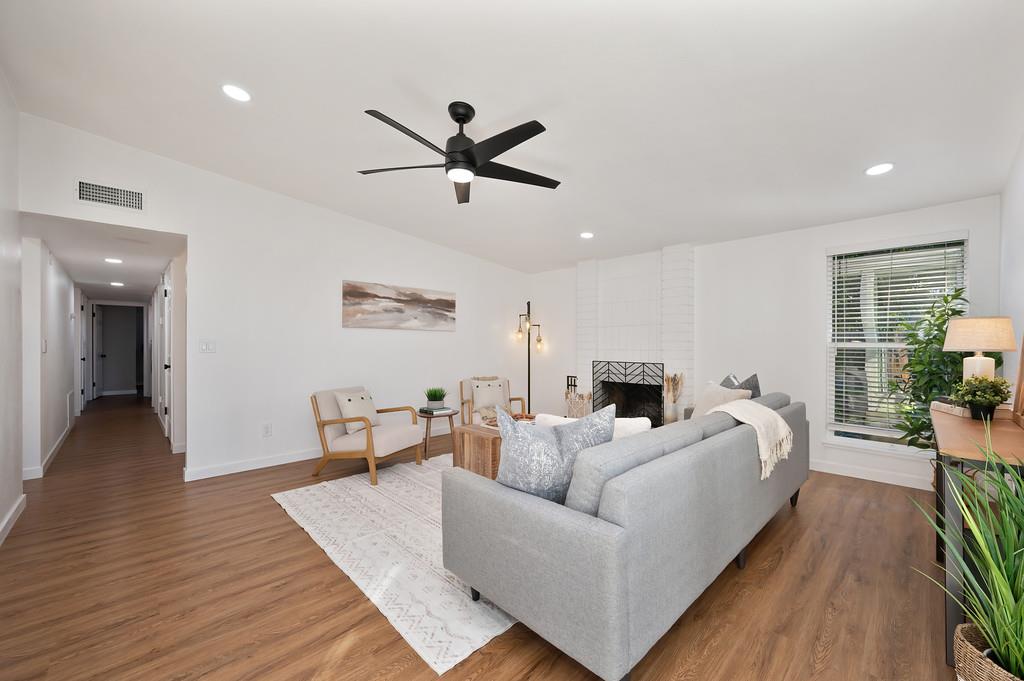 4812 Packard Court Carmichael, CA 95608 - Photo 5 of 39 a living room with furniture and a wooden floor