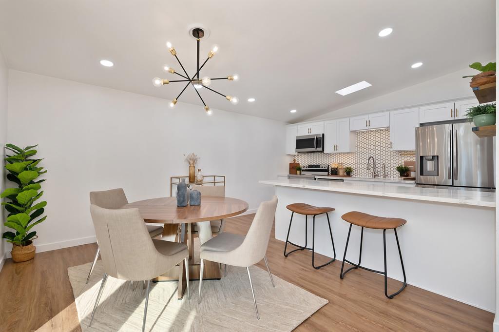 4812 Packard Court Carmichael, CA 95608 - Photo 8 of 39 a dining room with furniture and wooden floor