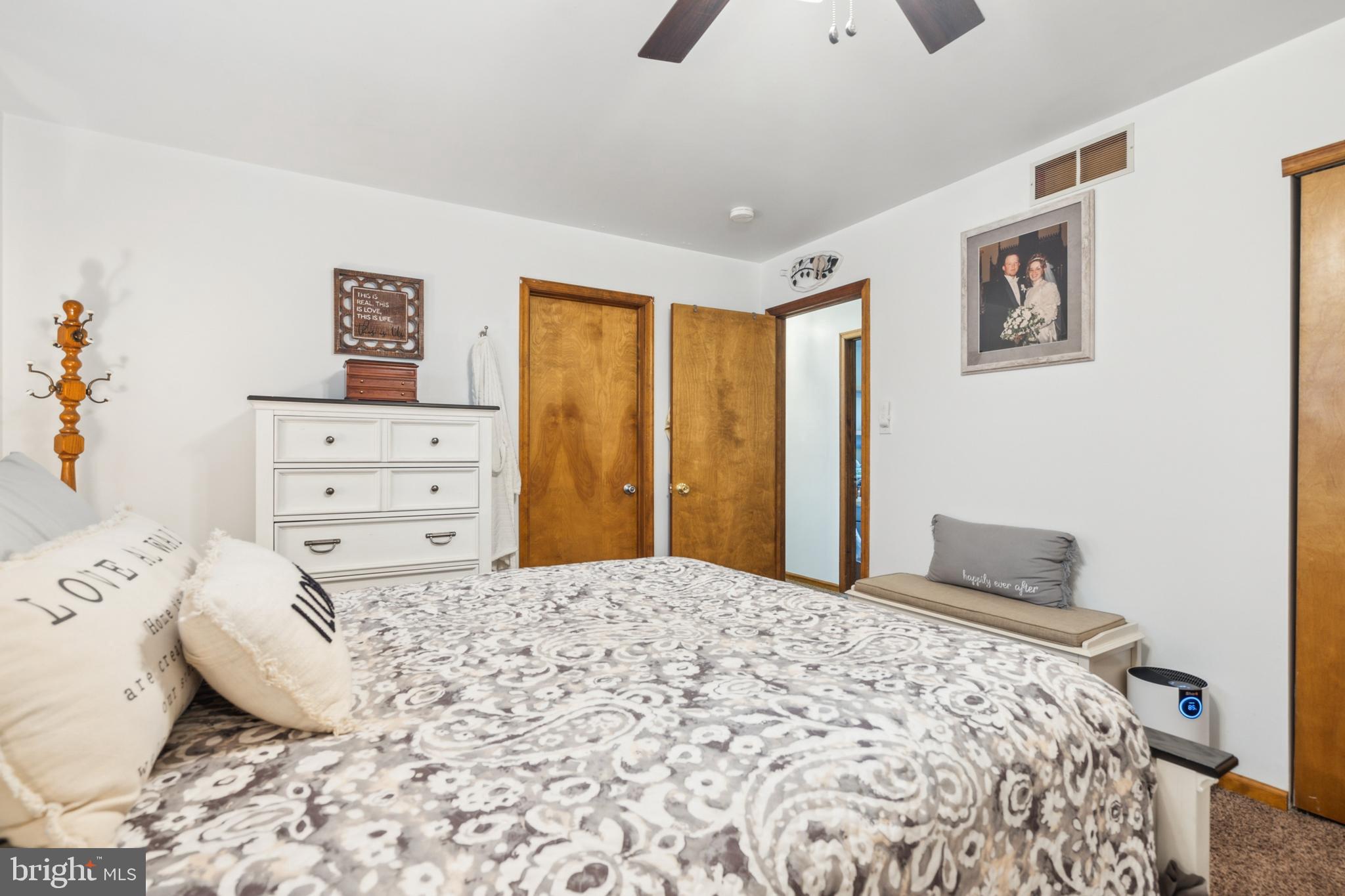 20 Holly Trail Alloway, NJ 08302 - Photo 13 of 26 a bedroom with a bed and a dresser in it