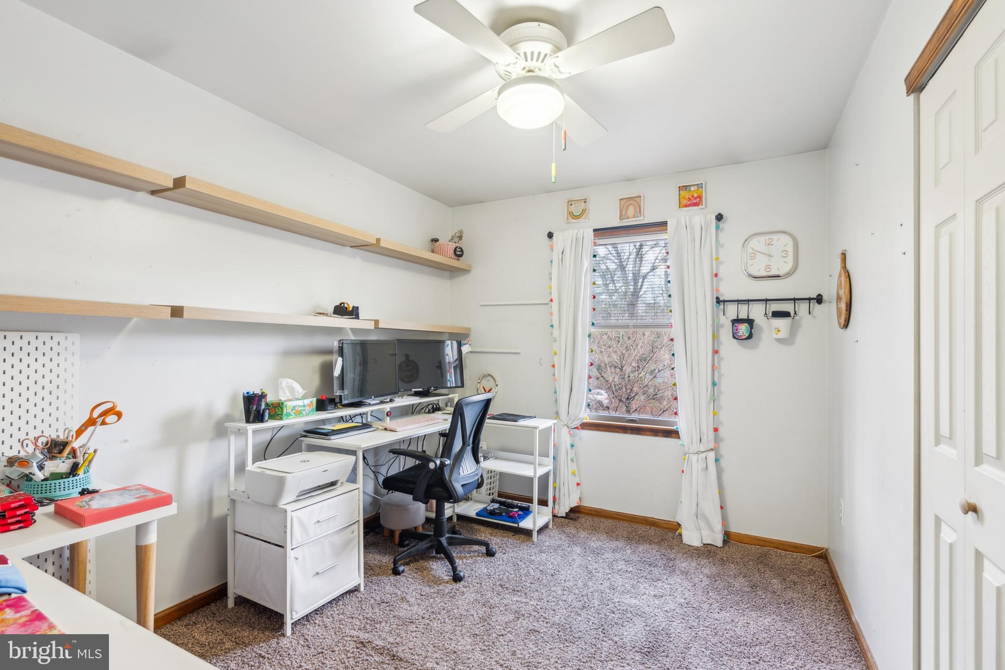 20 Holly Trail Alloway, NJ 08302 - Photo 16 of 26 a view of a workspace with furniture and a window