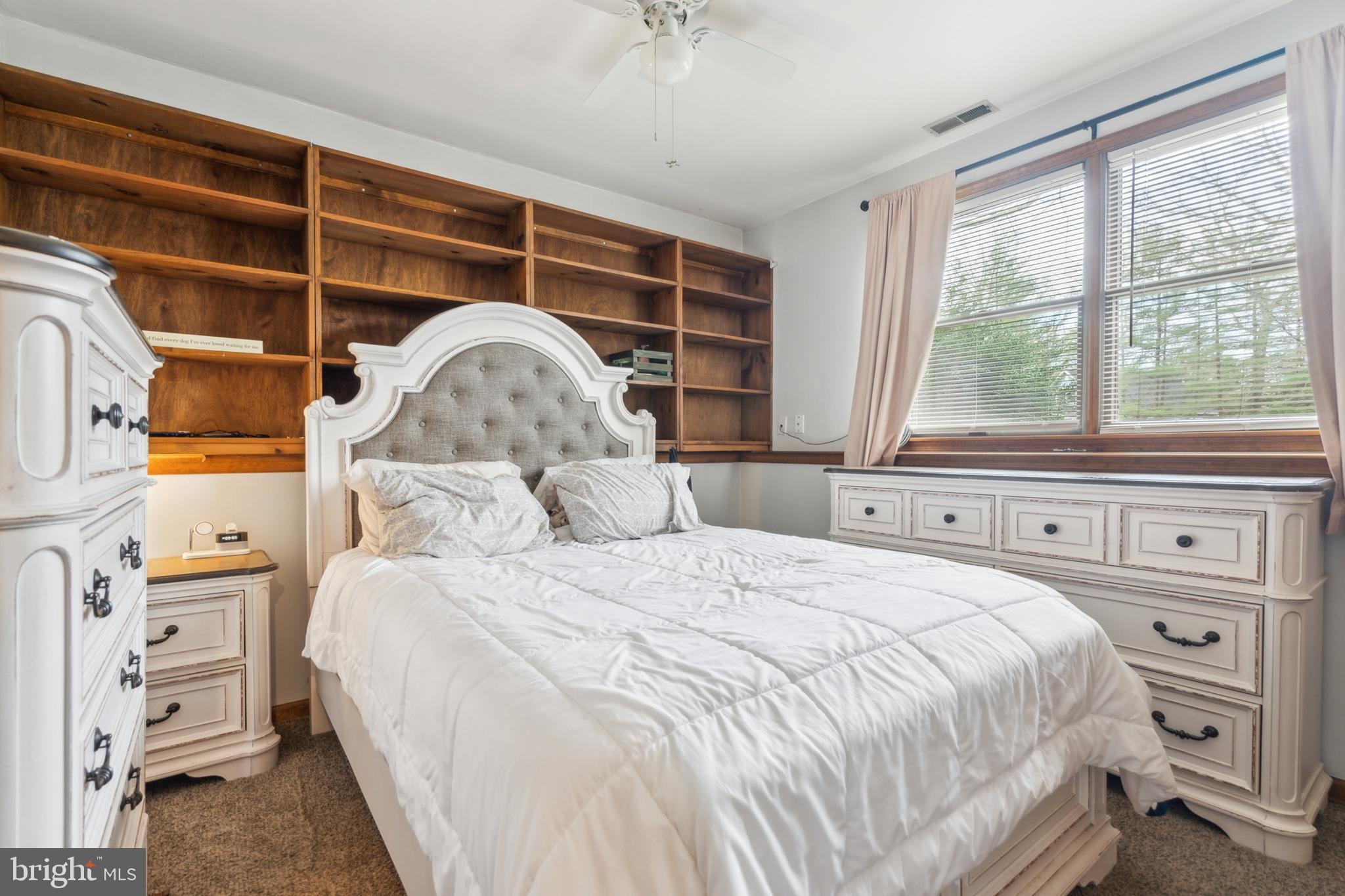 20 Holly Trail Alloway, NJ 08302 - Photo 20 of 26 a bedroom with a bed and a window