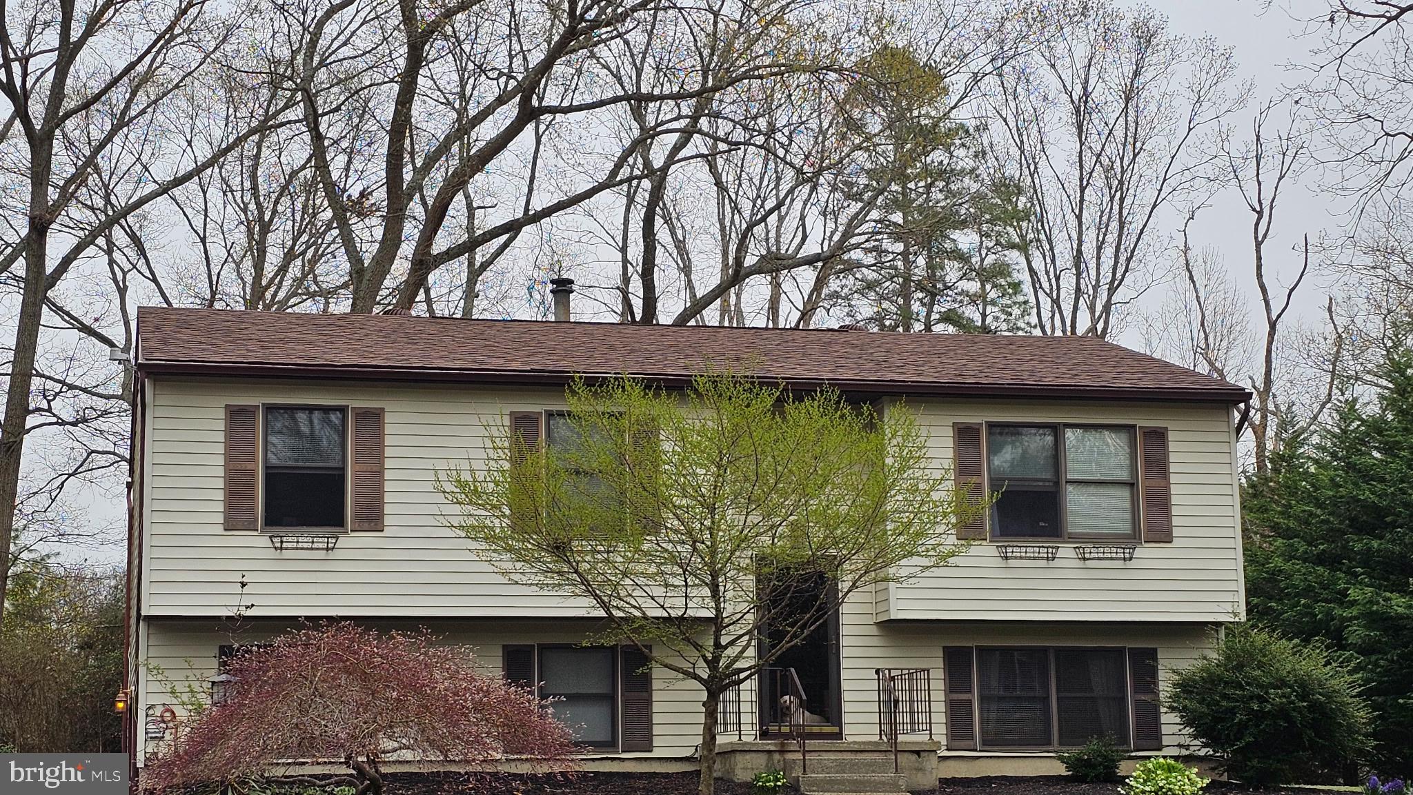 20 Holly Trail Alloway, NJ 08302 - Photo 25 of 26 a front view of a house with garden