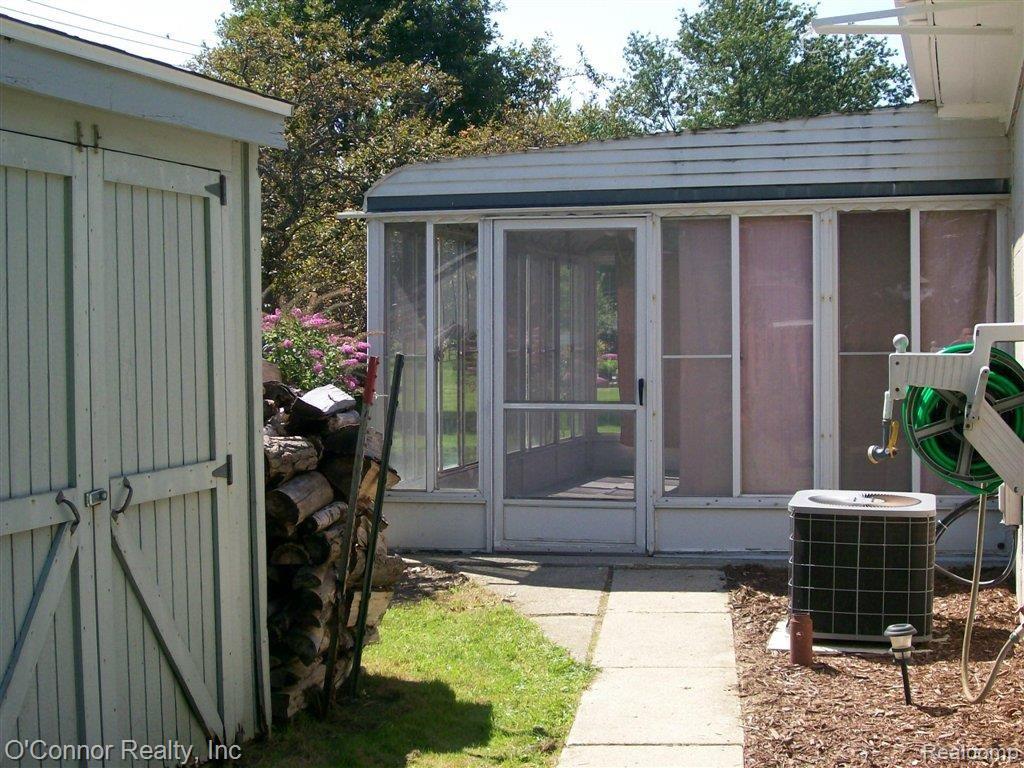 4077 Yankee Road St. Clair, MI 48079 - Photo 12 of 16 Shed and Sunroom.JPG