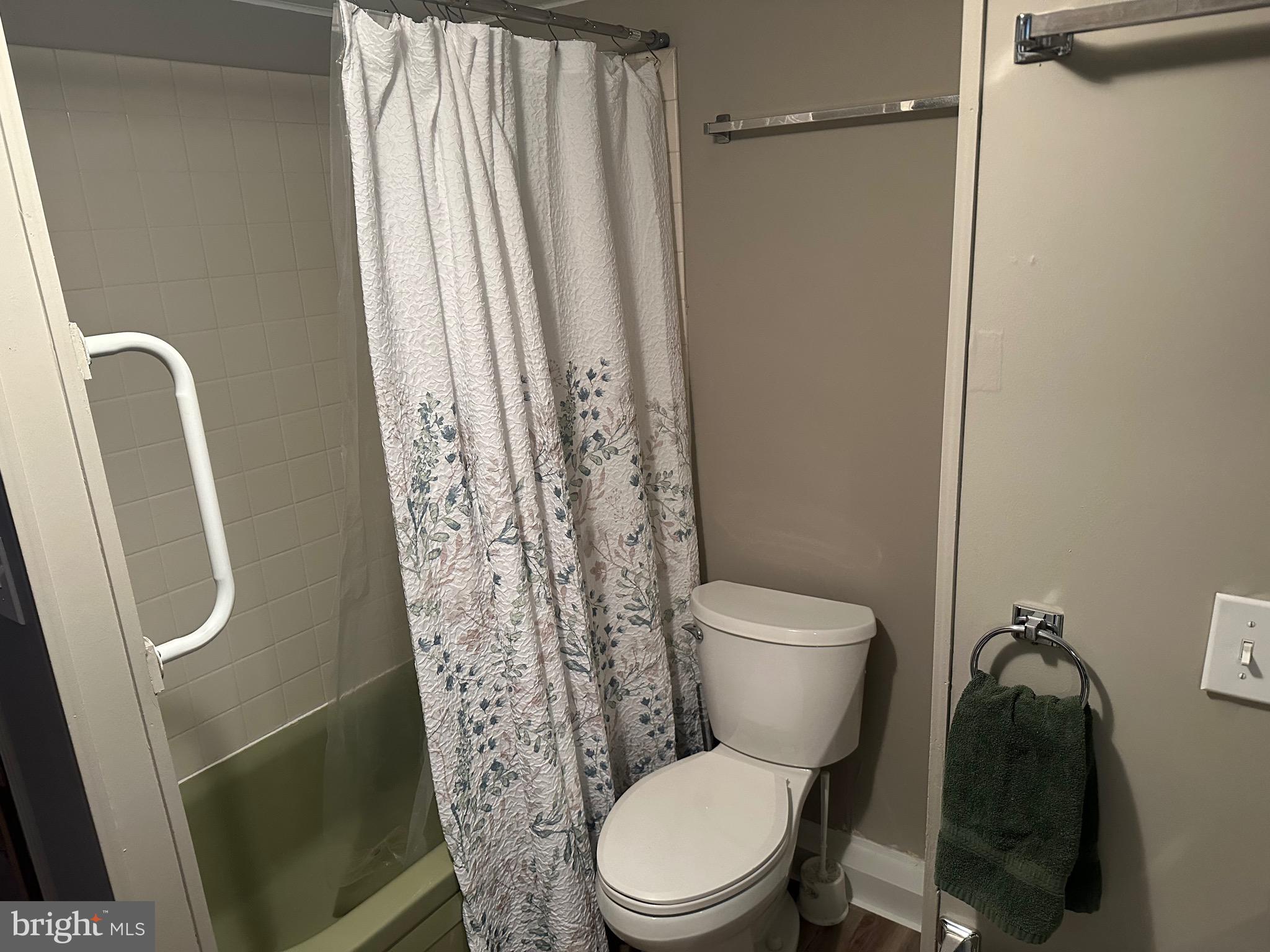 9 Maple Quakertown, PA 18951 - Photo 9 of 12 a white toilet sitting next to a small sink