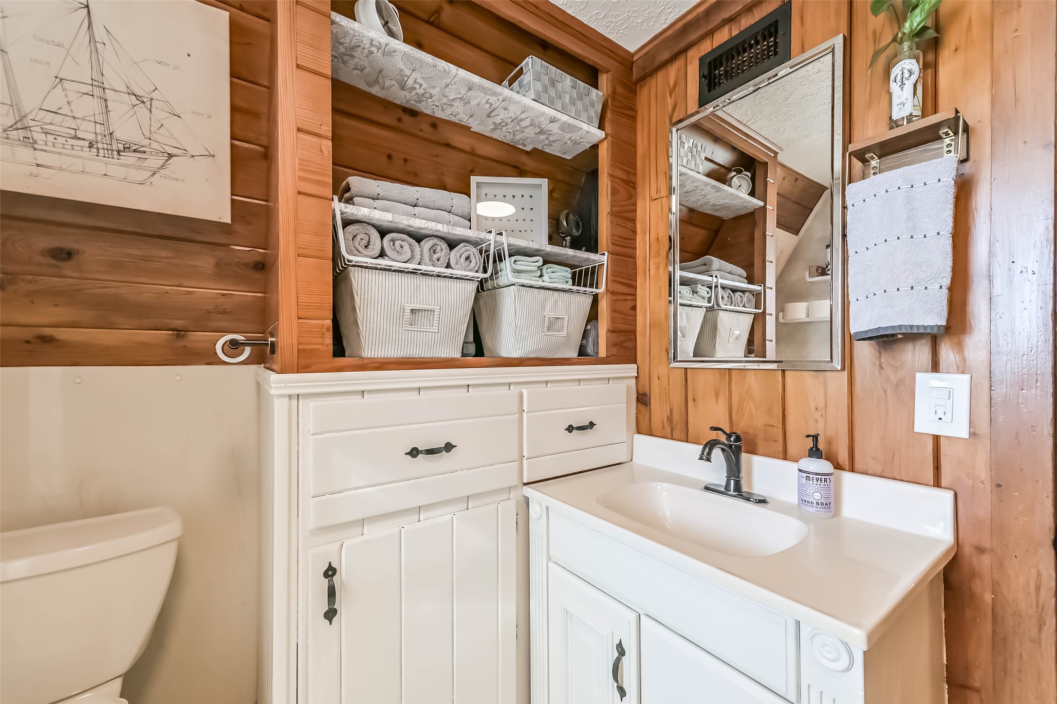 2009 Todville Road Seabrook, TX 77586 - Photo 12 of 46 a bathroom with a sink and a mirror