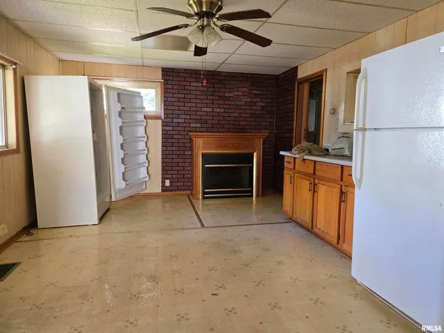 a view of a livingroom with a fireplace