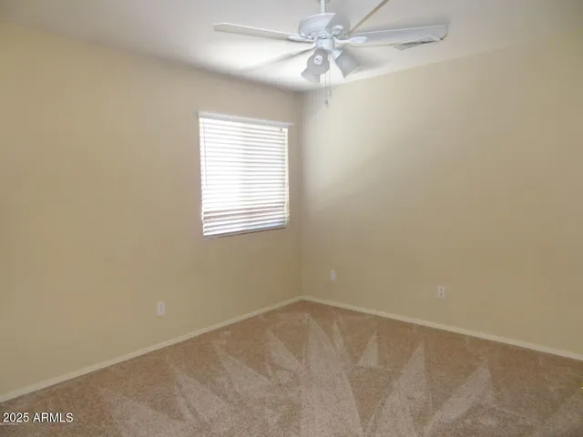 a bathroom with a double vanity sink and mirror