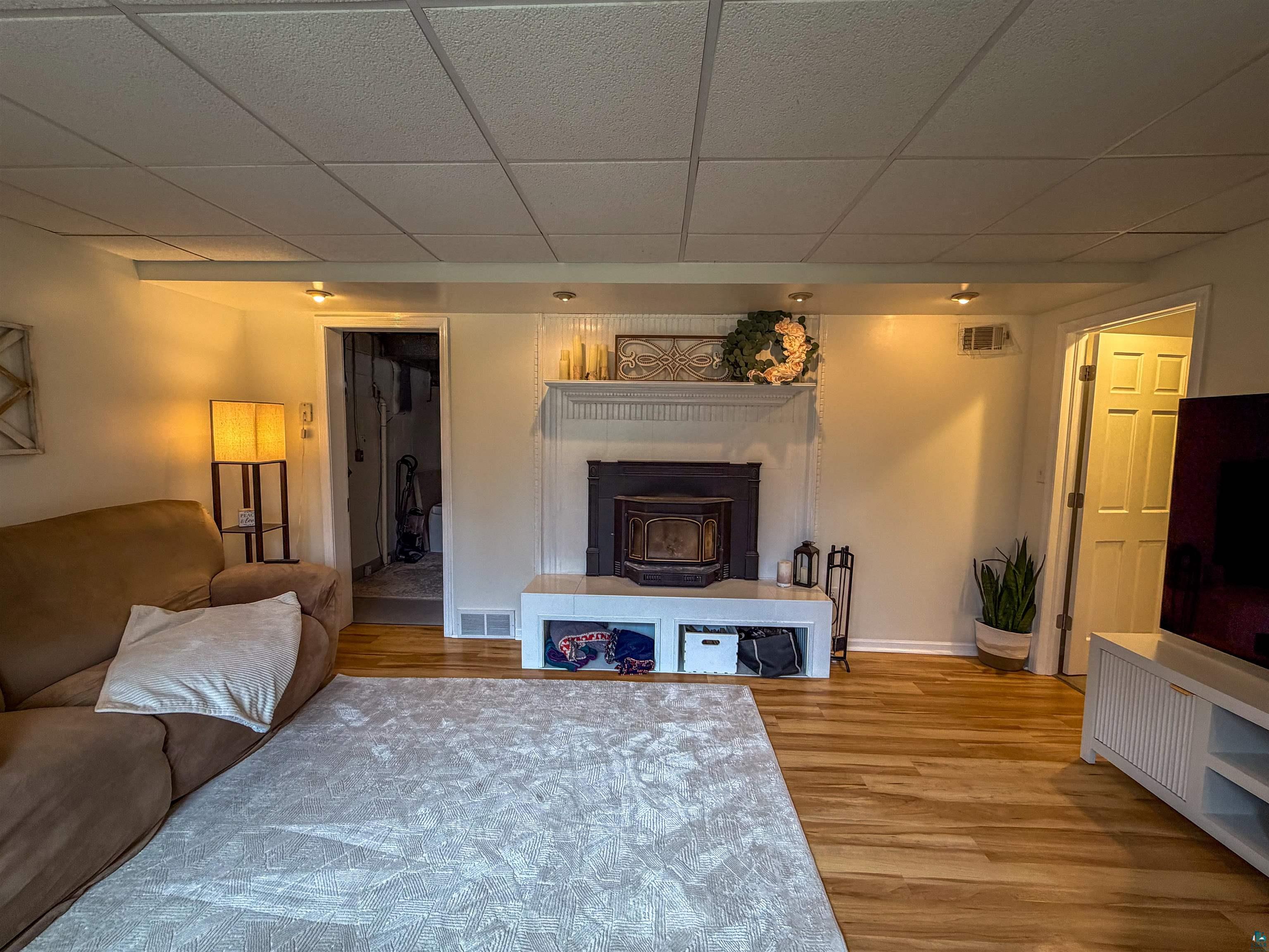 3704 Greysolon Road Duluth, MN 55804 - Photo 23 of 51 Wood-finish flooring complemented by a white drop ceiling