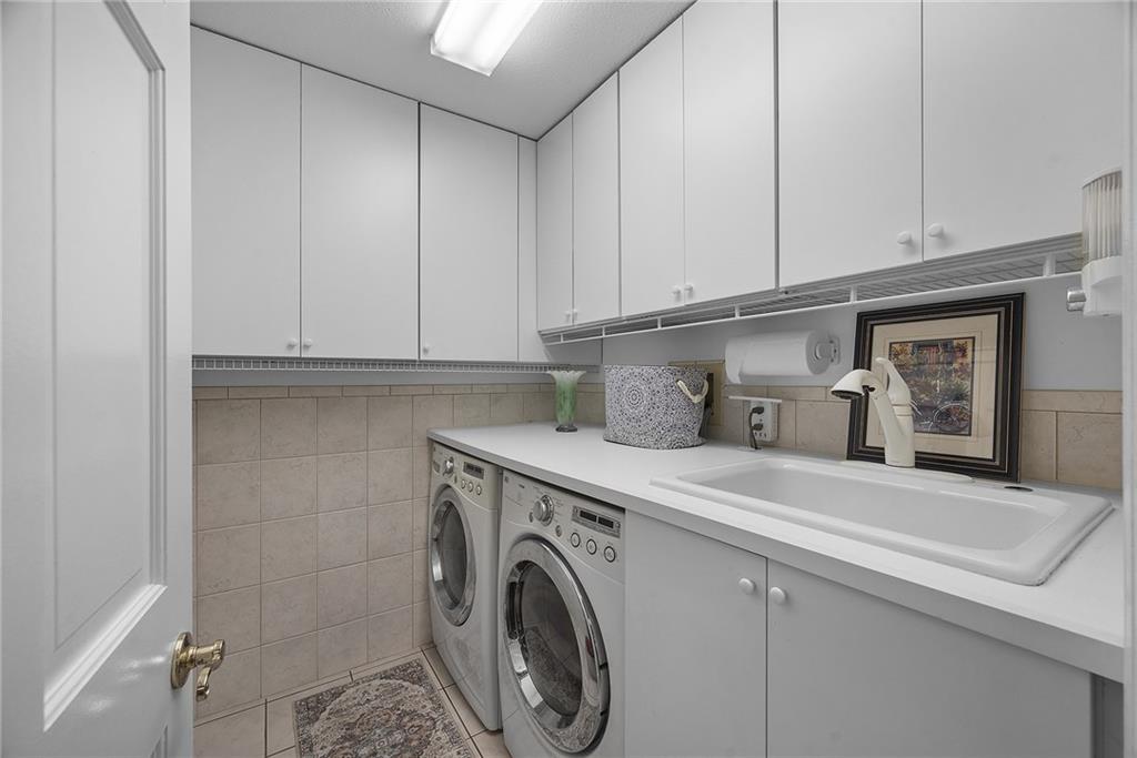 2779 Clearview Road Allison Park, PA 15101 - Photo 27 of 50 Convenient main floor laundry with cabinets
