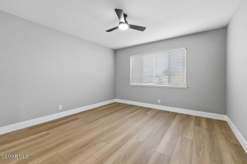 1069 Donner Avenue Simi Valley, CA 93065 - Photo 17 of 24 wooden floor in an empty room with a window