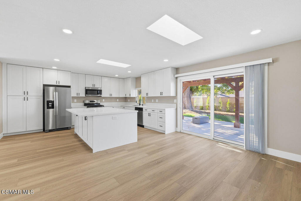 1069 Donner Avenue Simi Valley, CA 93065 - Photo 6 of 24 a view of kitchen with wooden floor