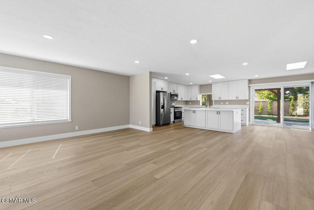 1069 Donner Avenue Simi Valley, CA 93065 - Photo 10 of 24 a view of a kitchen with a sink and a stove top oven