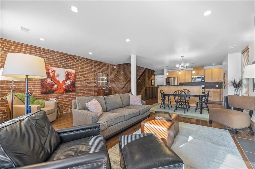 5811 Rippey Street, Unit B Pittsburgh, PA 15206 - Photo 11 of 25 a living room with furniture and a large window
