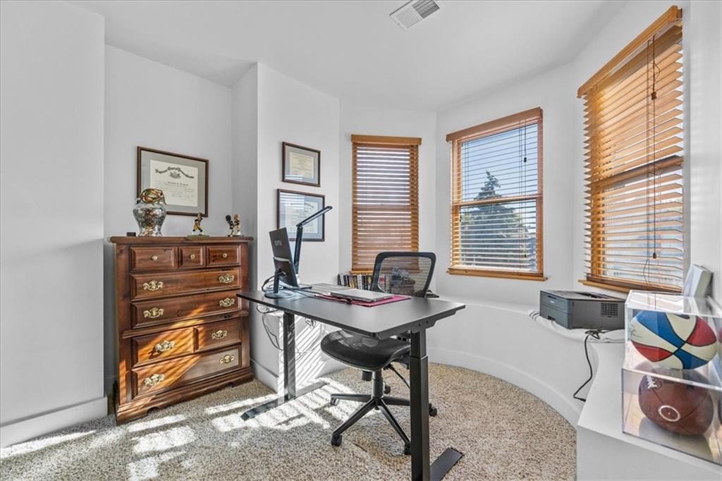 5811 Rippey Street, Unit B Pittsburgh, PA 15206 - Photo 19 of 25 a view of a workspace with furniture and a window