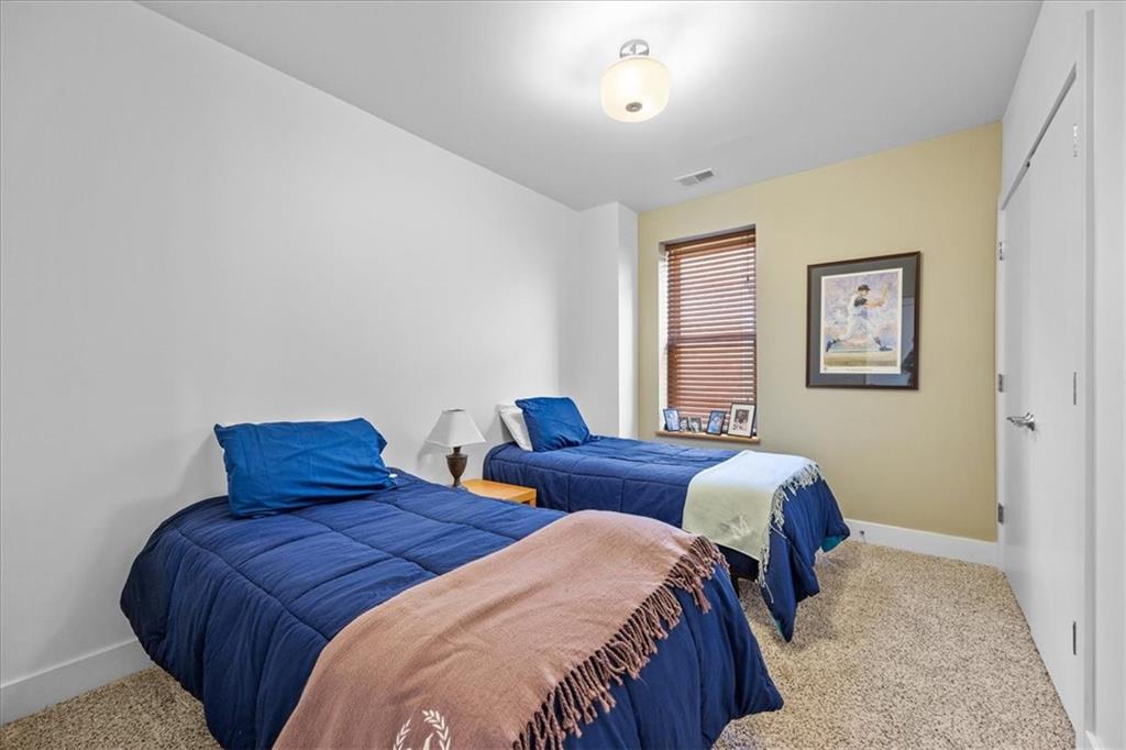 5811 Rippey Street, Unit B Pittsburgh, PA 15206 - Photo 20 of 25 a bedroom with two beds and a table