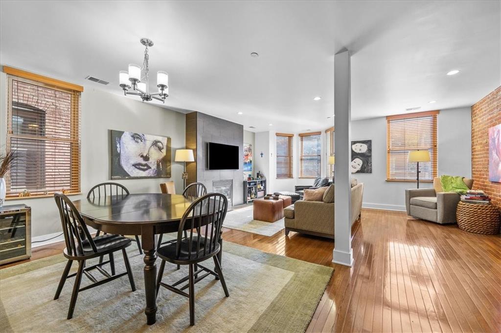 5811 Rippey Street, Unit B Pittsburgh, PA 15206 - Photo 7 of 25 a view of a dining room with furniture window and wooden floor