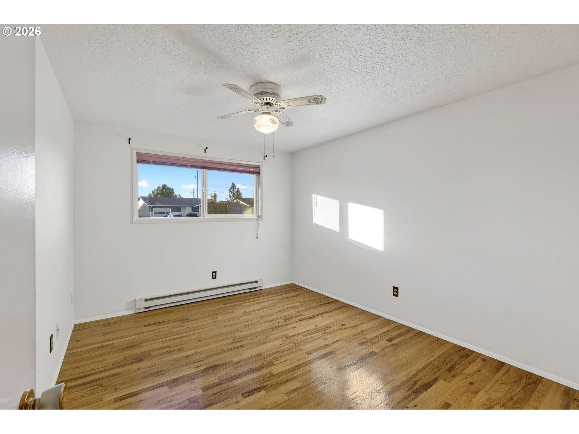 1620 Thompson Road Woodburn, OR 97071 - Photo 16 of 30 a view of an empty room with a window
