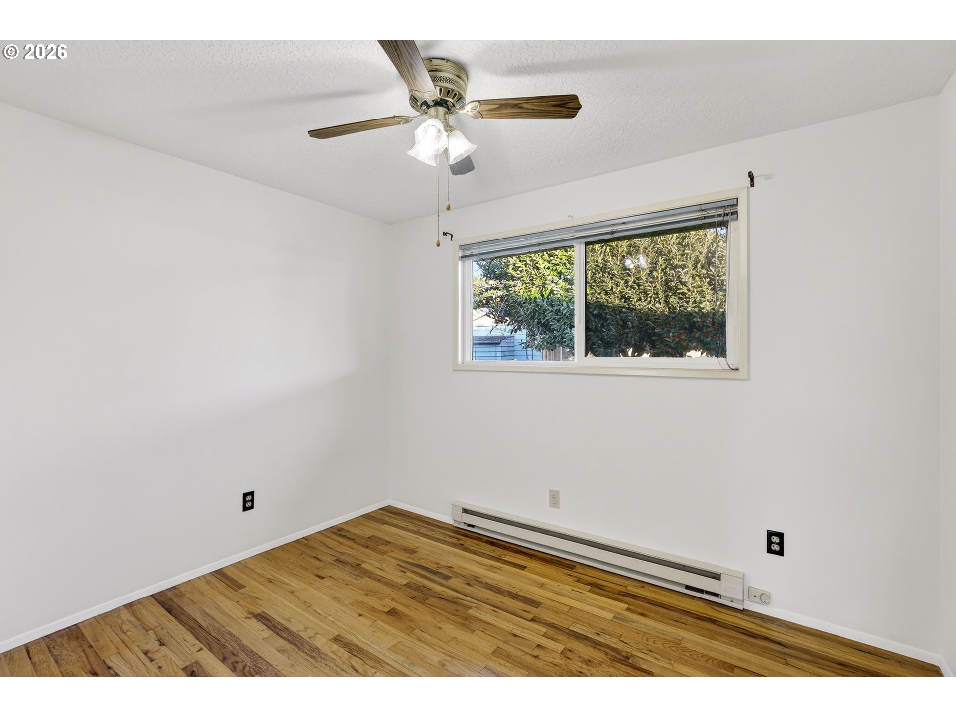 1620 Thompson Road Woodburn, OR 97071 - Photo 22 of 30 a view of an empty room with a window