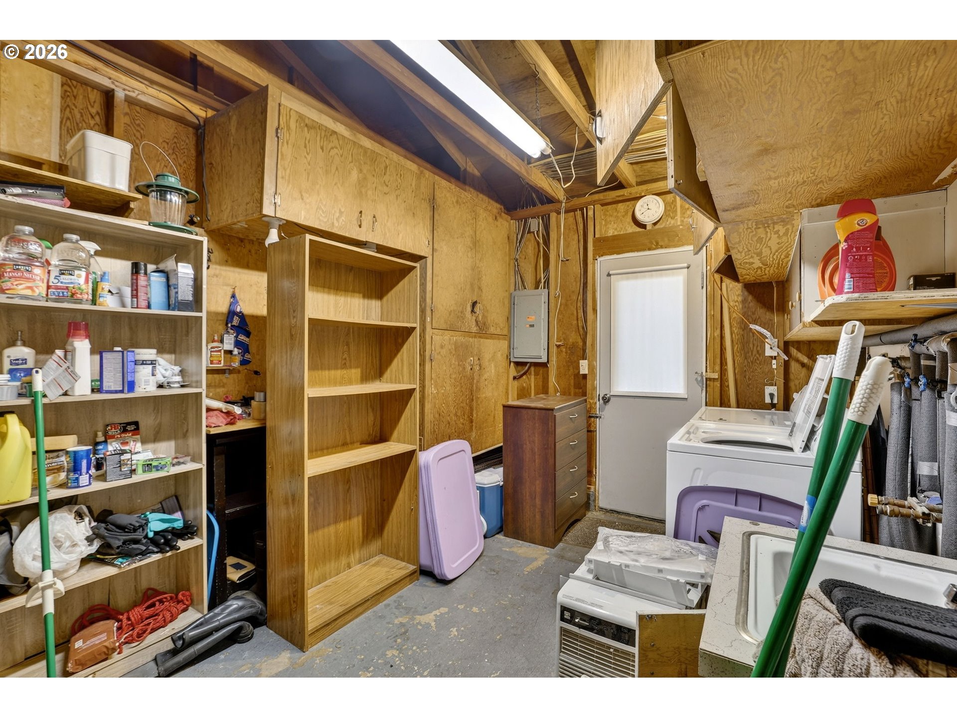 1620 Thompson Road Woodburn, OR 97071 - Photo 25 of 30 a view of living room with clothes and shoes