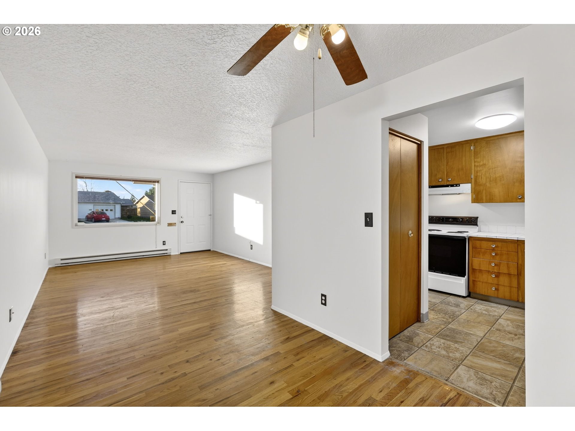 1620 Thompson Road Woodburn, OR 97071 - Photo 9 of 30 a view interior of a house wooden floor and windows