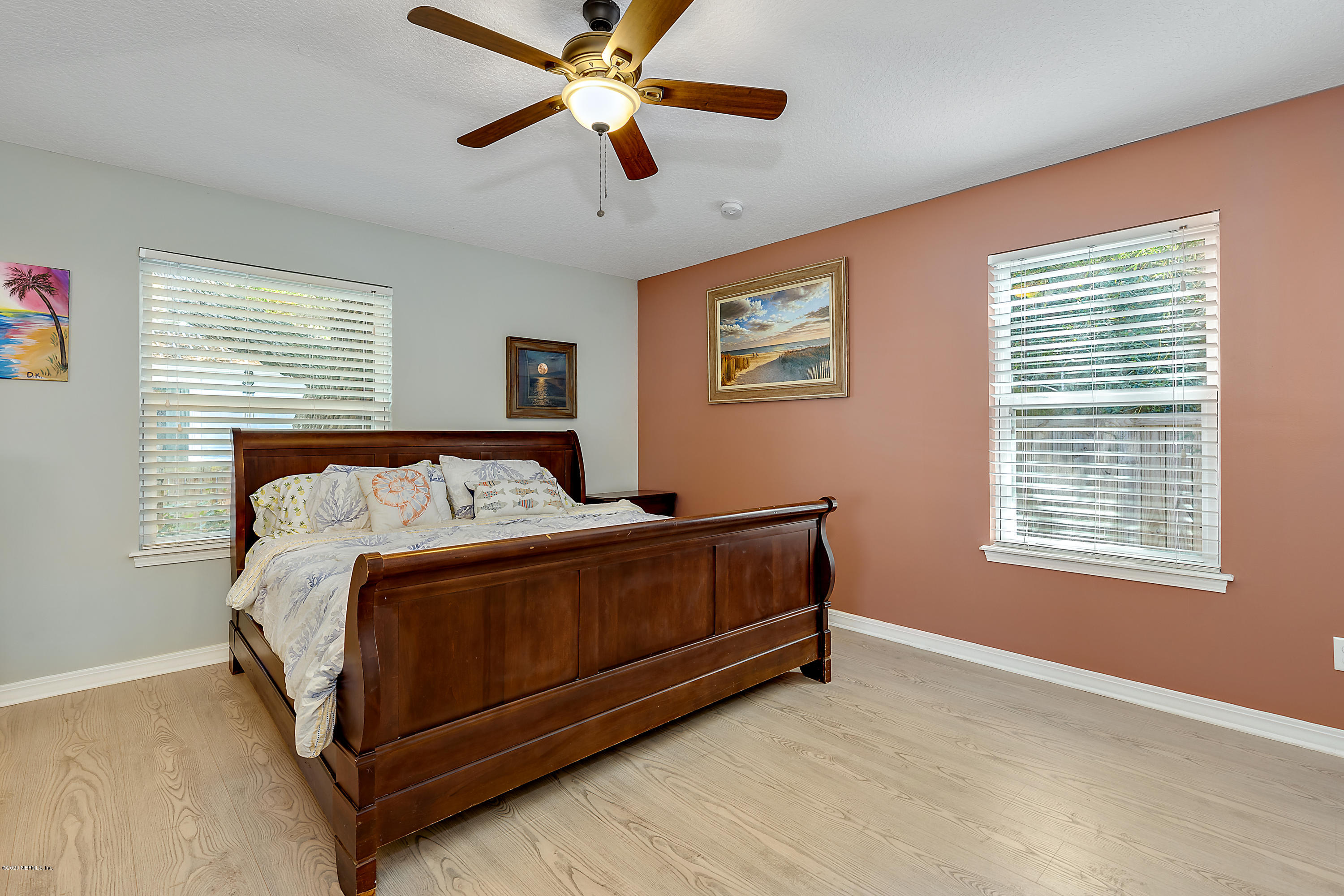 405 2nd Street St. Augustine, FL 32084 - Photo 12 of 32 a bed room with a bed and a ceiling fan