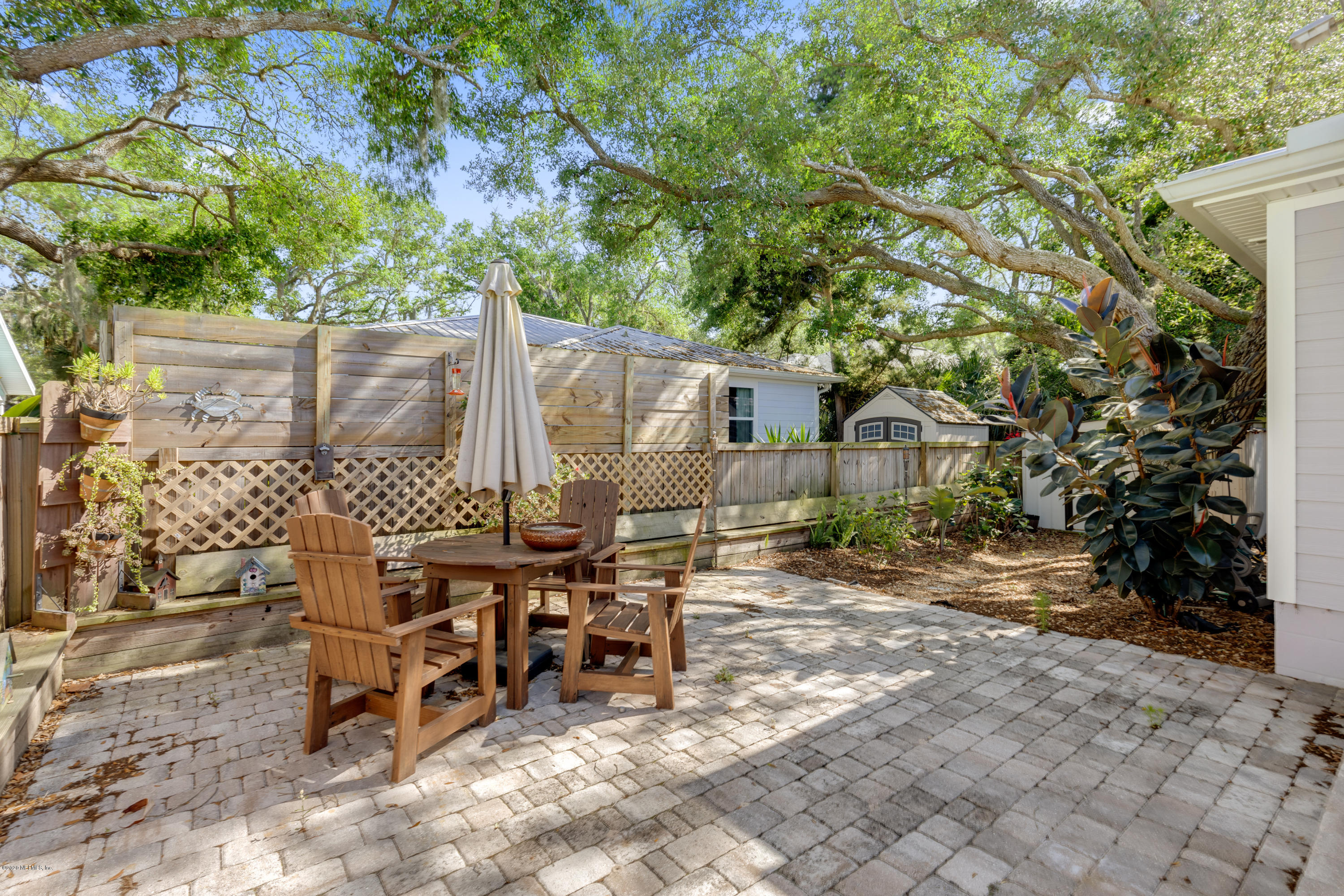405 2nd Street St. Augustine, FL 32084 - Photo 21 of 32 a view of a outdoor space with a patio