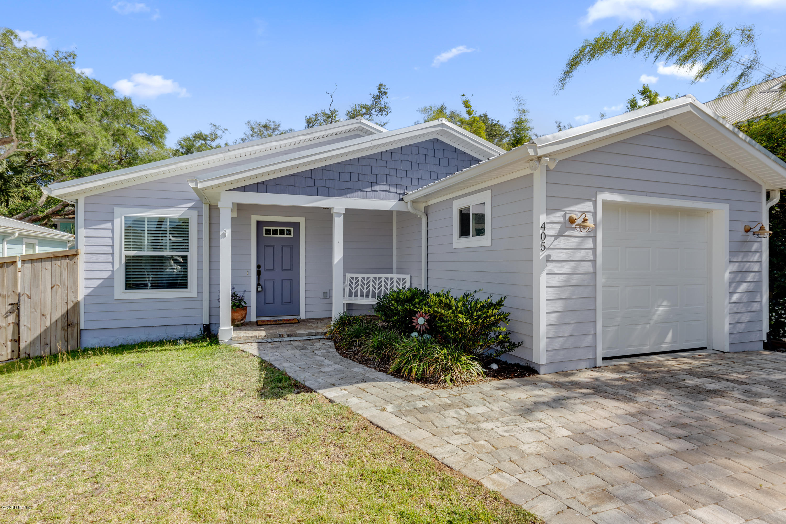 405 2nd Street St. Augustine, FL 32084 - Photo 3 of 32 a view of a house with small yard and plants