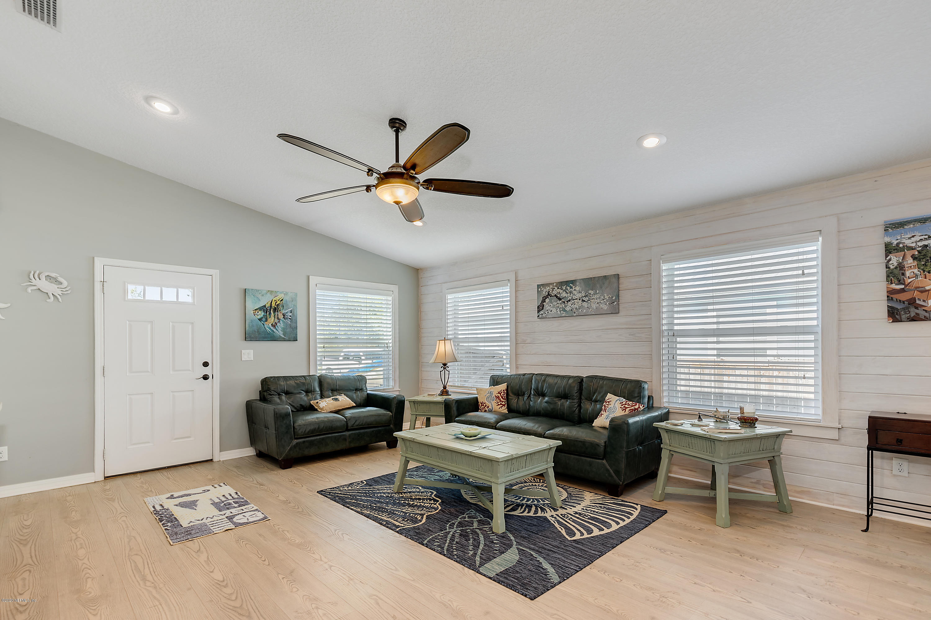 405 2nd Street St. Augustine, FL 32084 - Photo 6 of 32 a living room with furniture a window and a ceiling fan