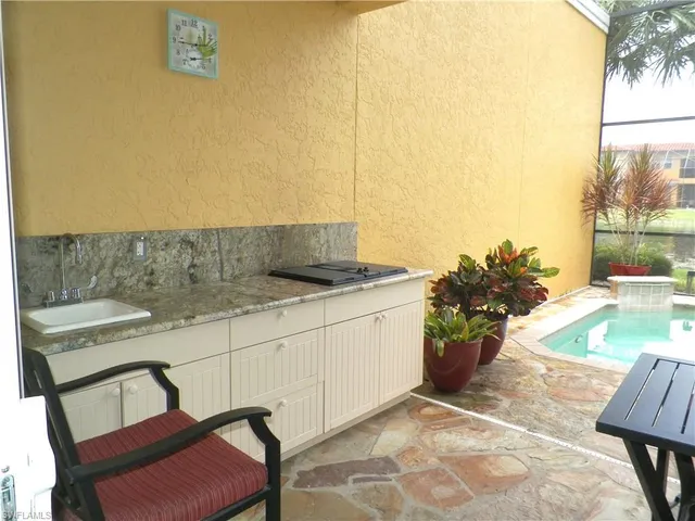 a living room with a couch and a table