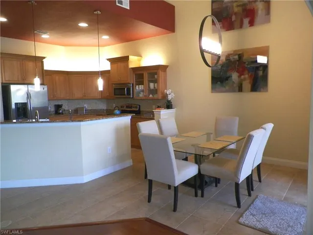 a view of a dining room with furniture