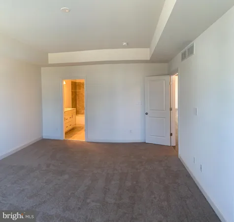 a bathroom with a double vanity sink and mirror