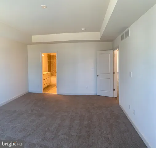 a bathroom with a double vanity sink and mirror