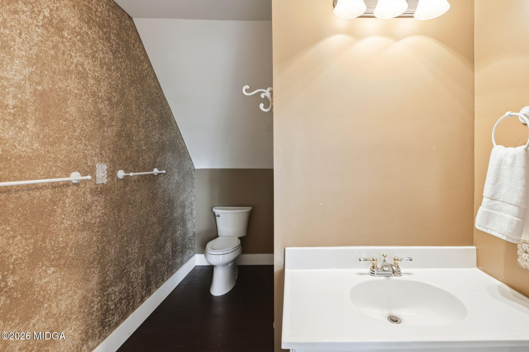 4686 Johnstonville Road Forsyth, GA 31029 - Photo 21 of 34 a bathroom with a sink and a mirror
