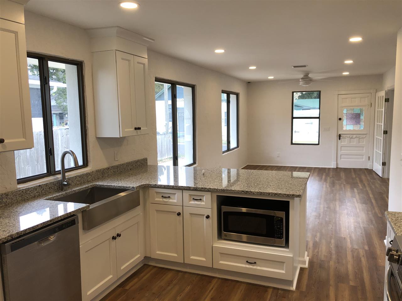 170 Twine Street St. Augustine, FL 32084 - Photo 15 of 24 a kitchen with granite countertop a sink and a stove top oven